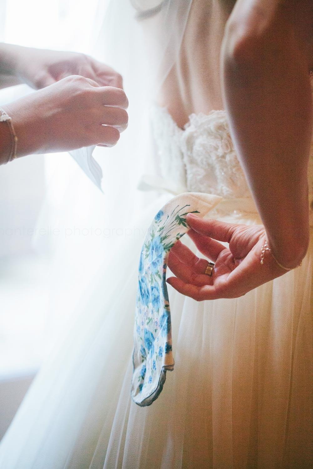 bride using grandmas hankerchief as something blue