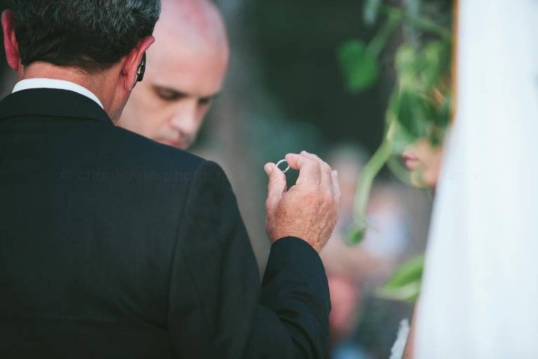 officiant holding ring during florida wedding ceremony
