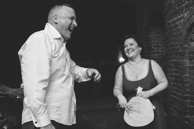 bride's parents laughing at florida wedding reception
