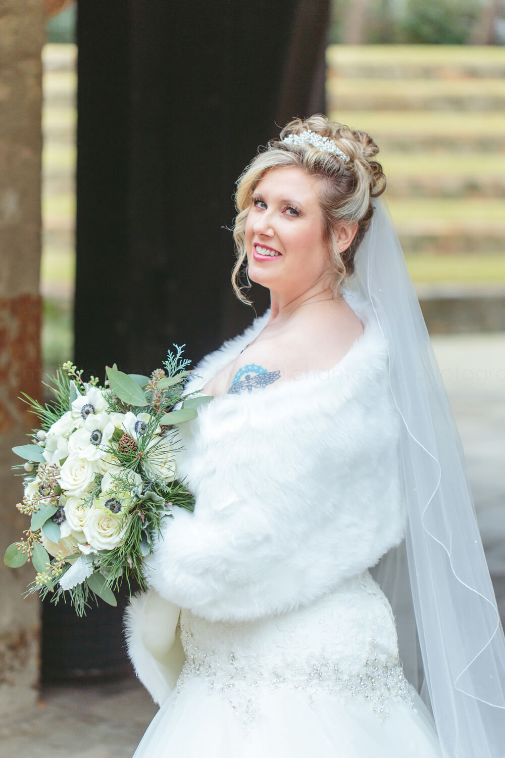 bride in white fur stole in montgomery