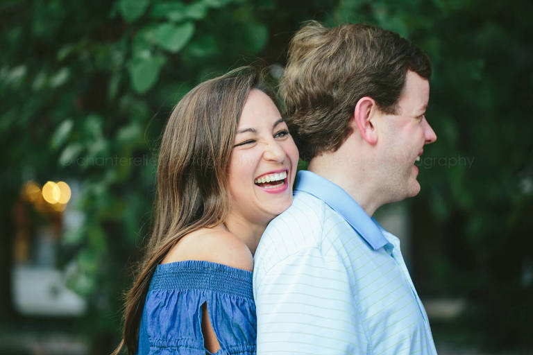 couple laughing during alabama engagement photo session