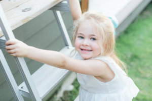 little blond girl at lake martin vacation home