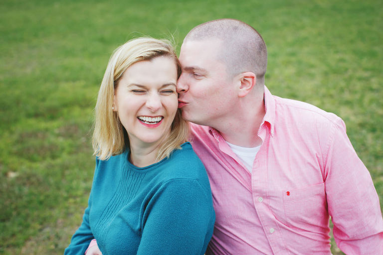 happy couple during park engagement session in montgomery
