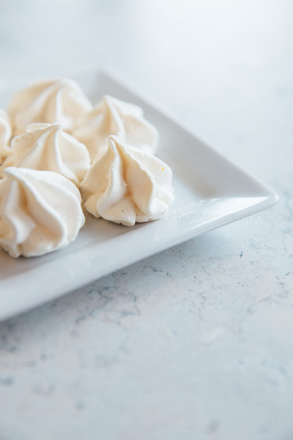 meringues on white plate at cake flour
