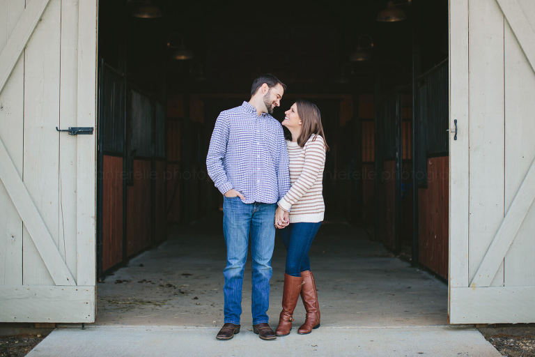 engaged couple at alabama horse stables
