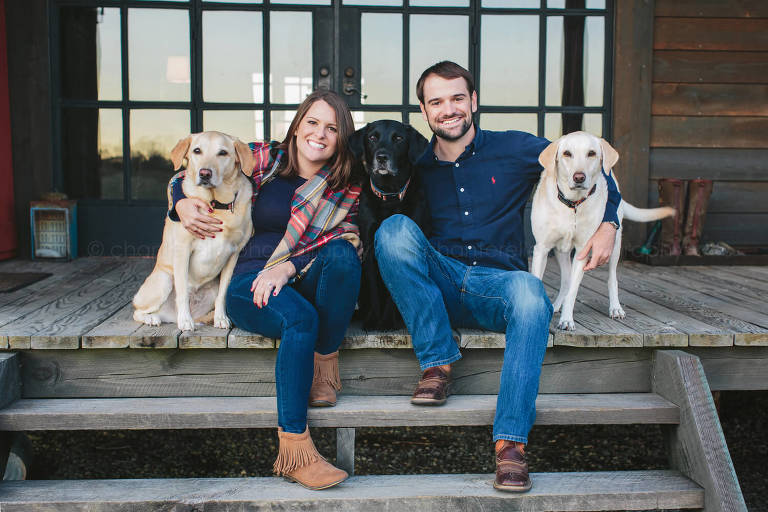 couple with dogs in alabama engagement session