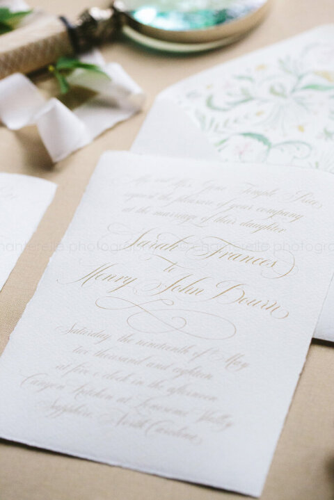 closeup of calligraphy on lonesome valley wedding invitation