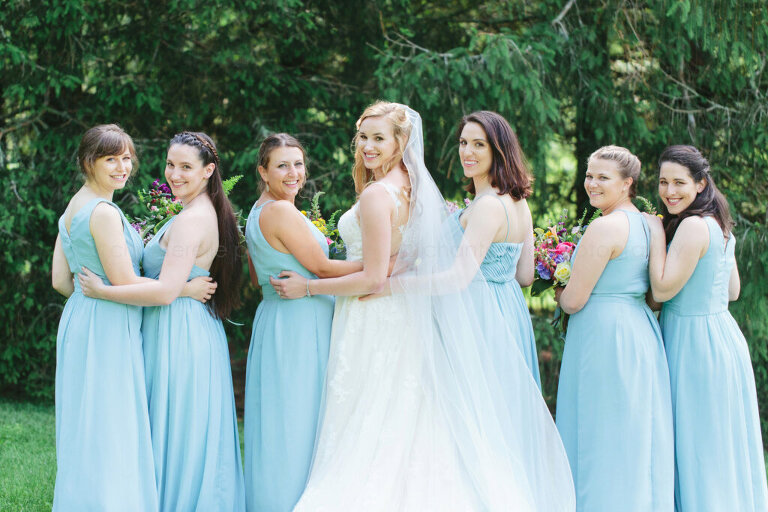 bride with bridesmaids in light blue dresses in lonesome valley