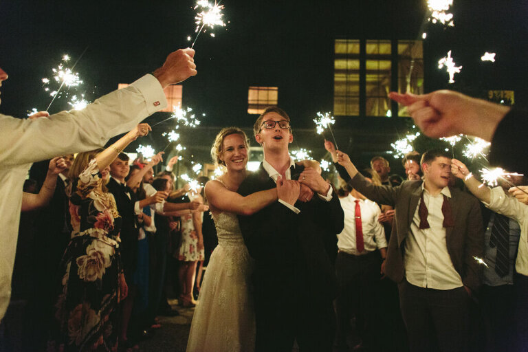 bride and groom with sparklers after lonesome valley wedding reception