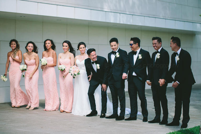 bridal party laughing at orange county wedding