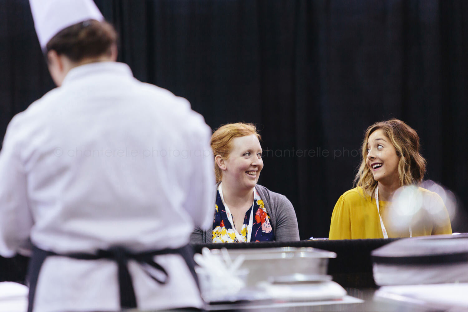 attendees chatting during culinary competition