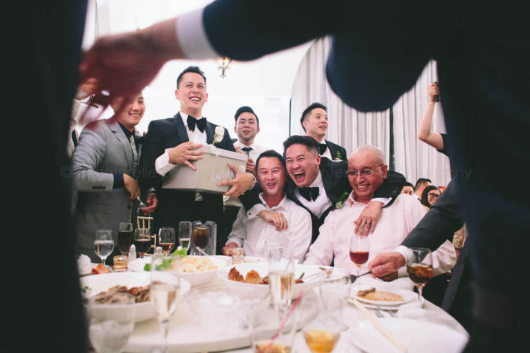 groom partying with guests at westminster wedding reception
