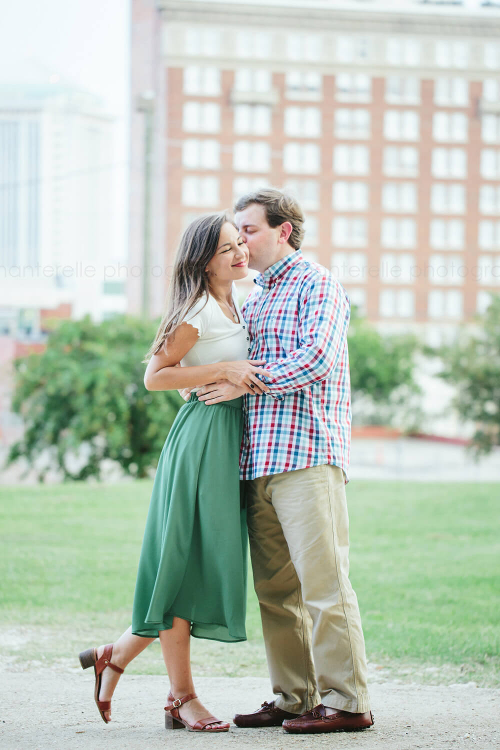 couple embracing in downtown montgomery