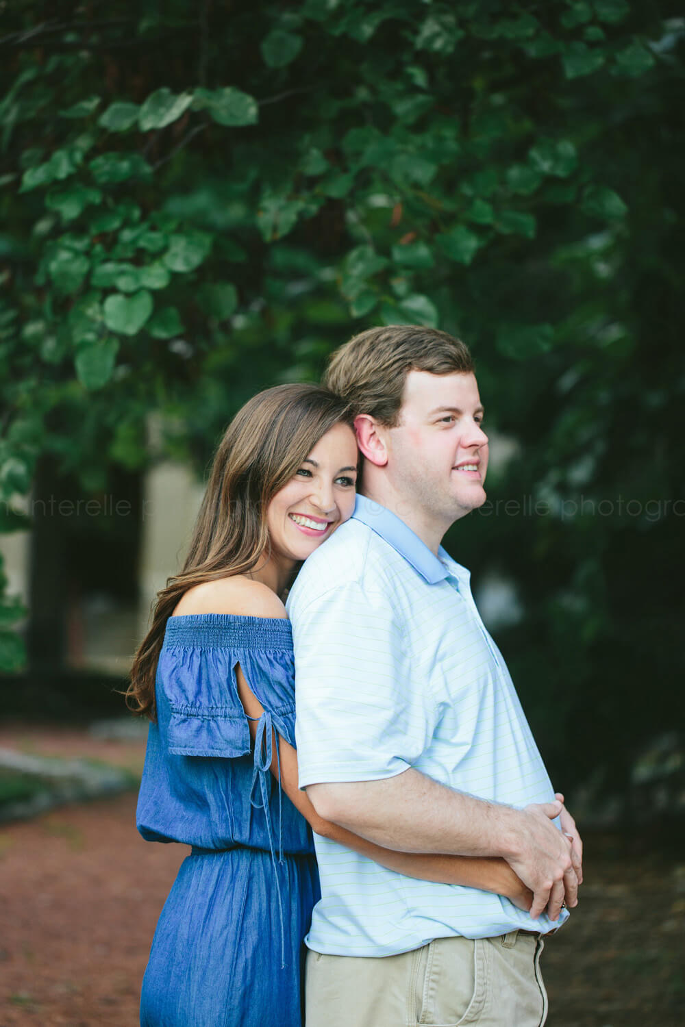 couple snuggling during montgomery engagement session