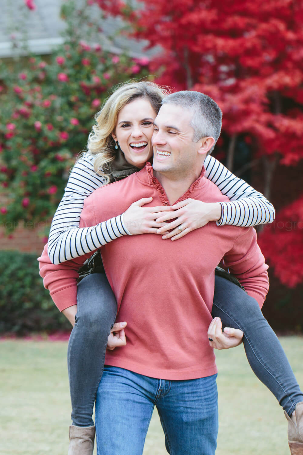 couple snuggling during montgomery portrait session