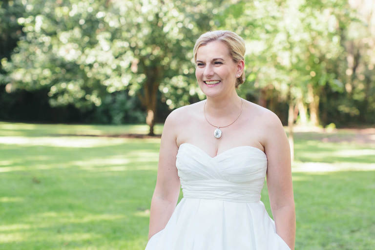 bride in davids bridal gown with pockets