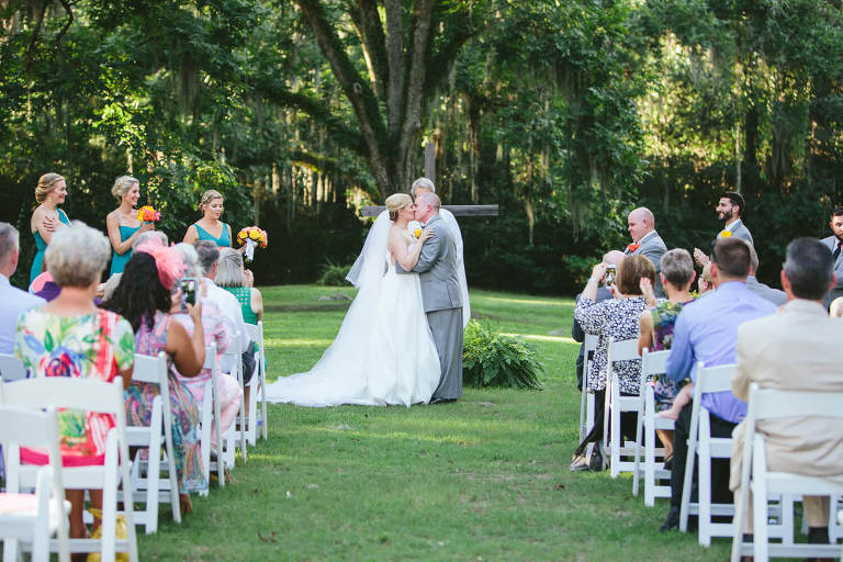 bride and groom kiss at the elms