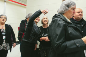 attendees get dressed for food tour