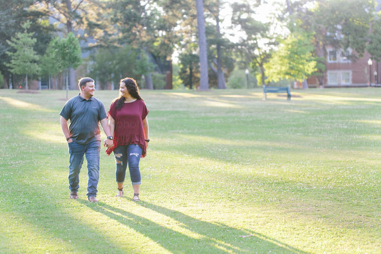 young couple walking in sunlight in montgomery