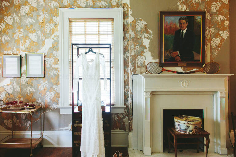 wedding dress hanging in f scott fitzgerald museum