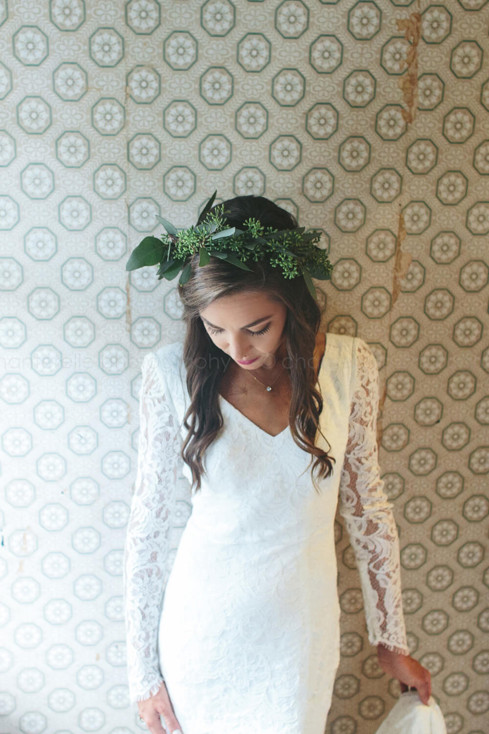bride wearing floral crown in theia gown