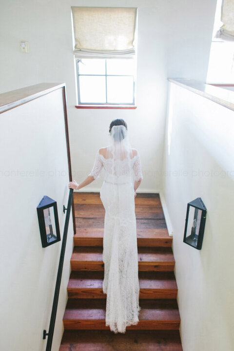 bride walking up stairs at summerour studio