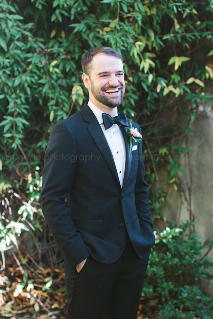 groom portrait in summerour courtyard