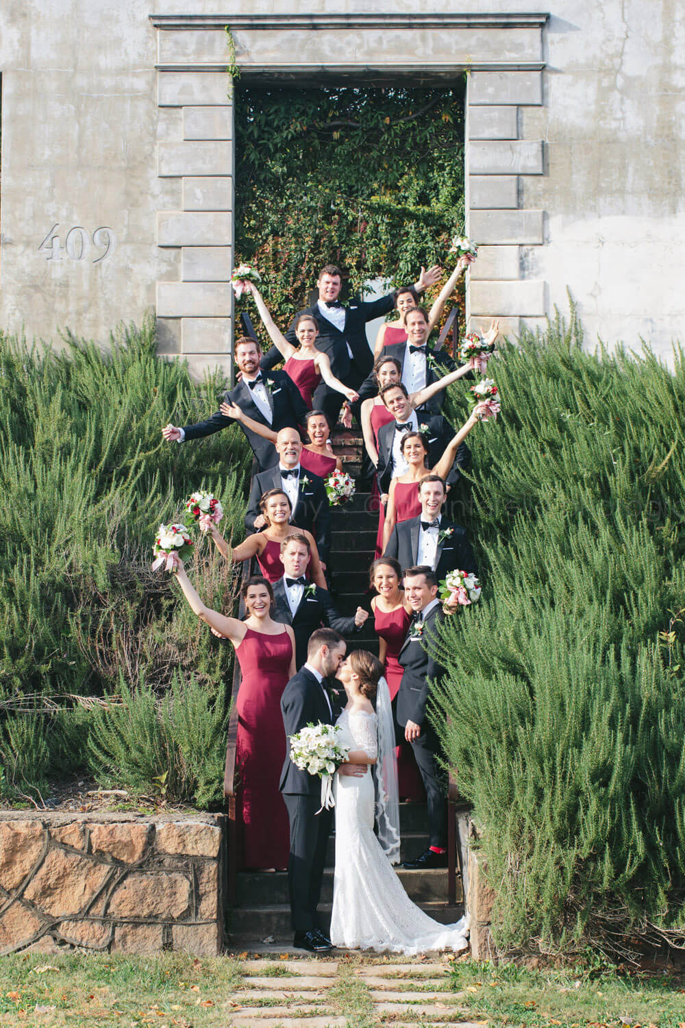 wedding party cheering outside summerour studio