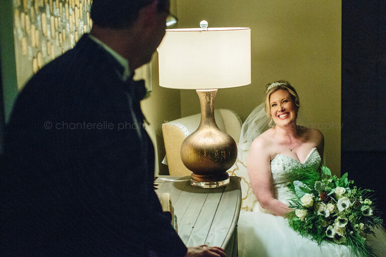 bride smiling while looking at groom