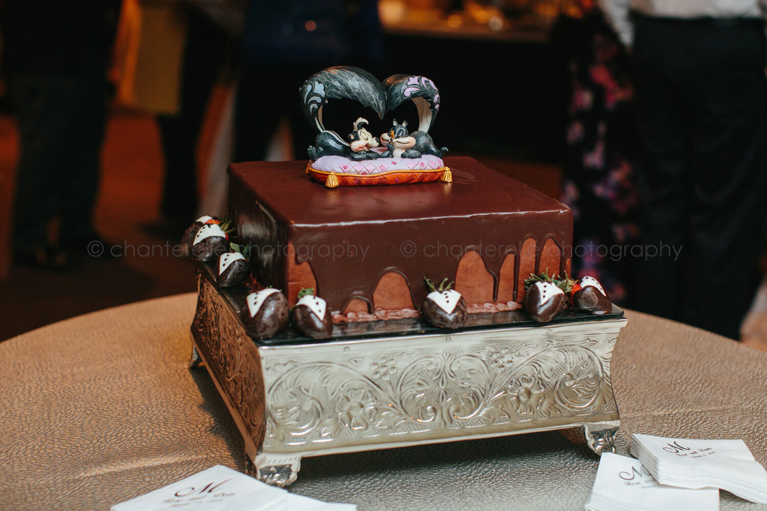 chocolate groom's cake with tuxedo strawberries
