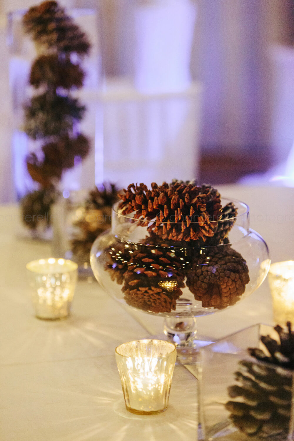 pinecone table decor at wedding reception