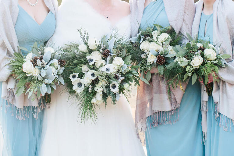 winter wedding bouquets with pinecones