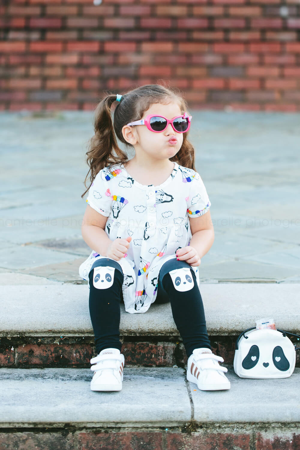 toddler girl in sunglasses at blount cultural prk