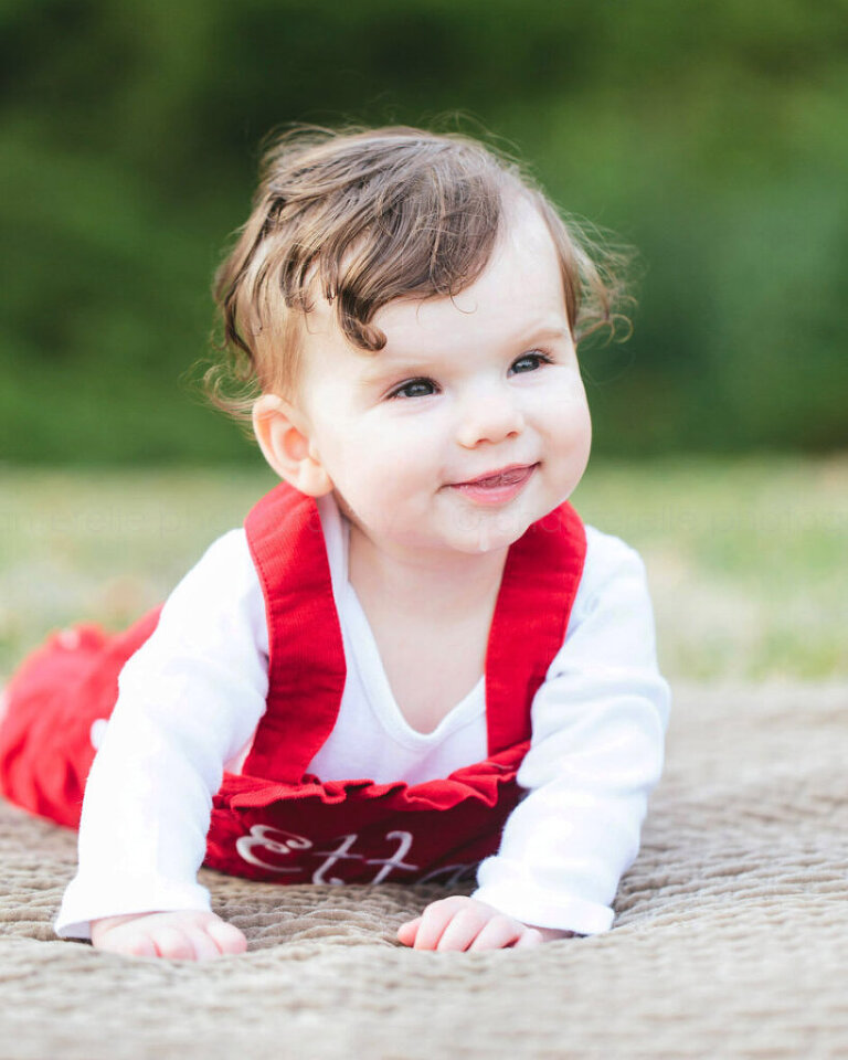 baby in red overalls at blount park