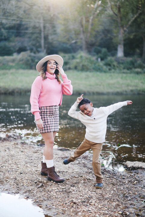 mom and son goofing around in fall outfits
